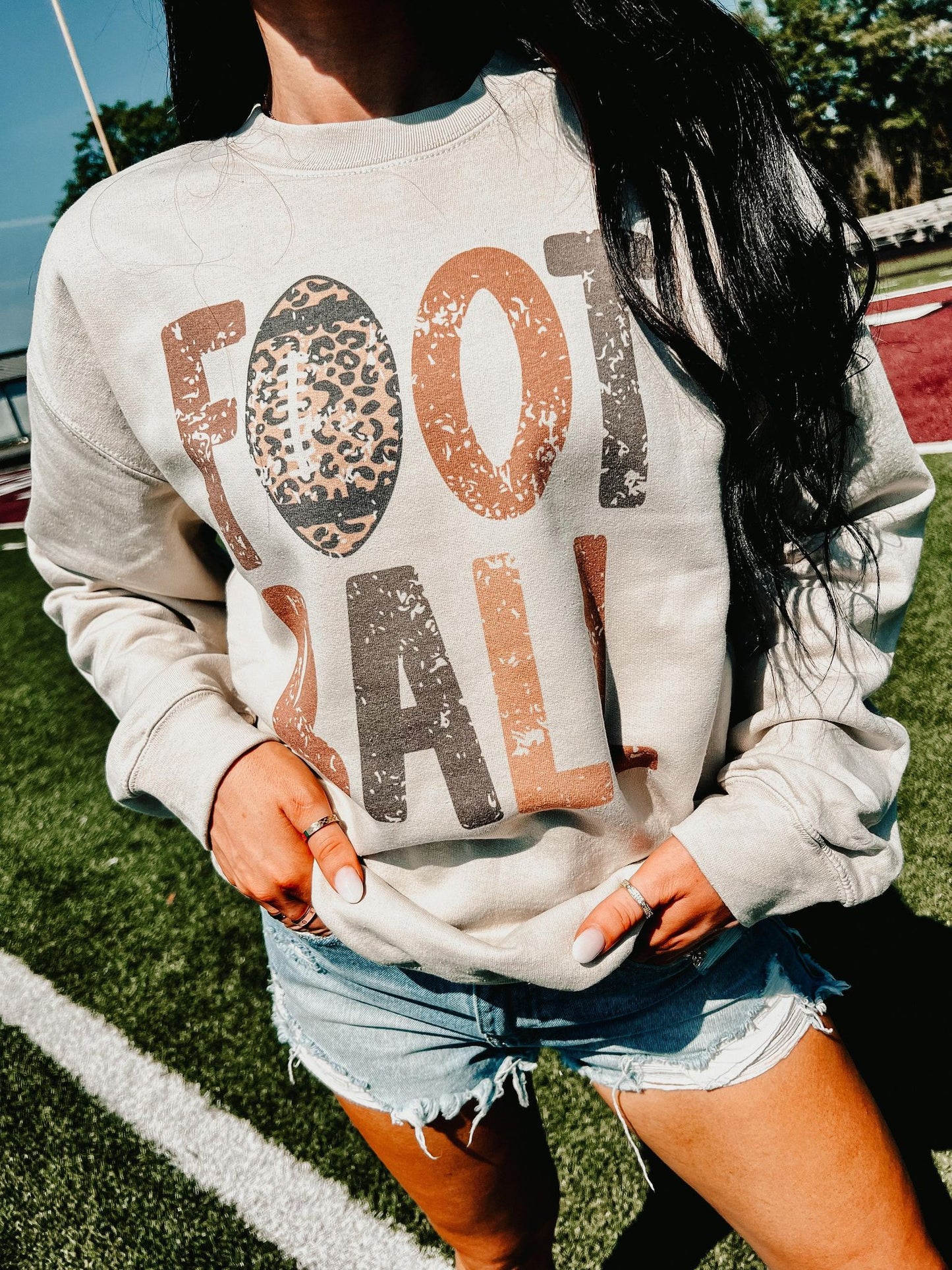 BEST SELLER- DISTRESSED LEOPARD FOOTBALL SWEATSHIRT