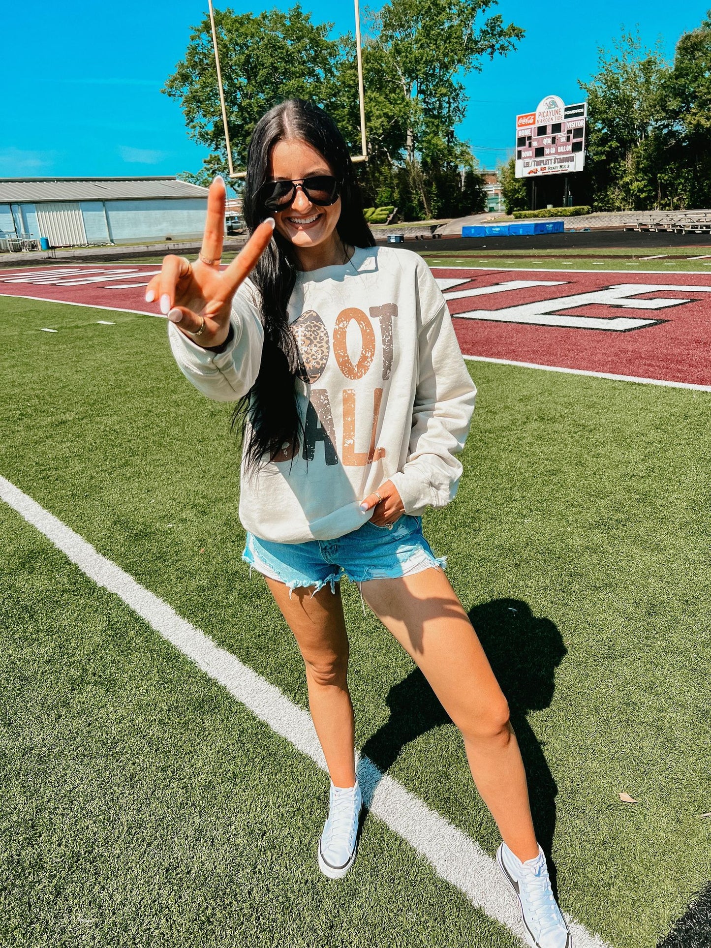 BEST SELLER- DISTRESSED LEOPARD FOOTBALL SWEATSHIRT