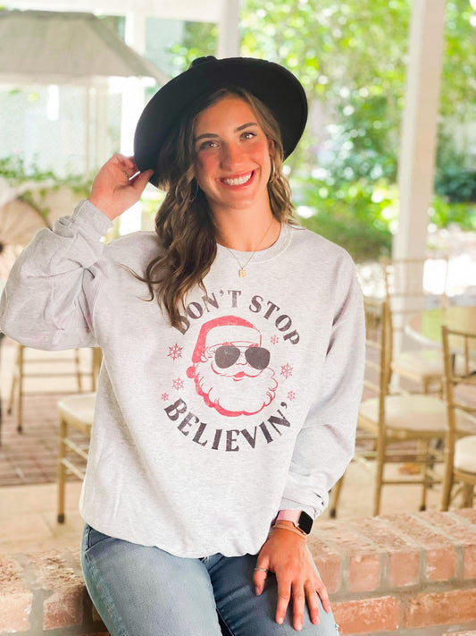 Don't Stop Believin' Santa Sunglasses Sweatshirt
